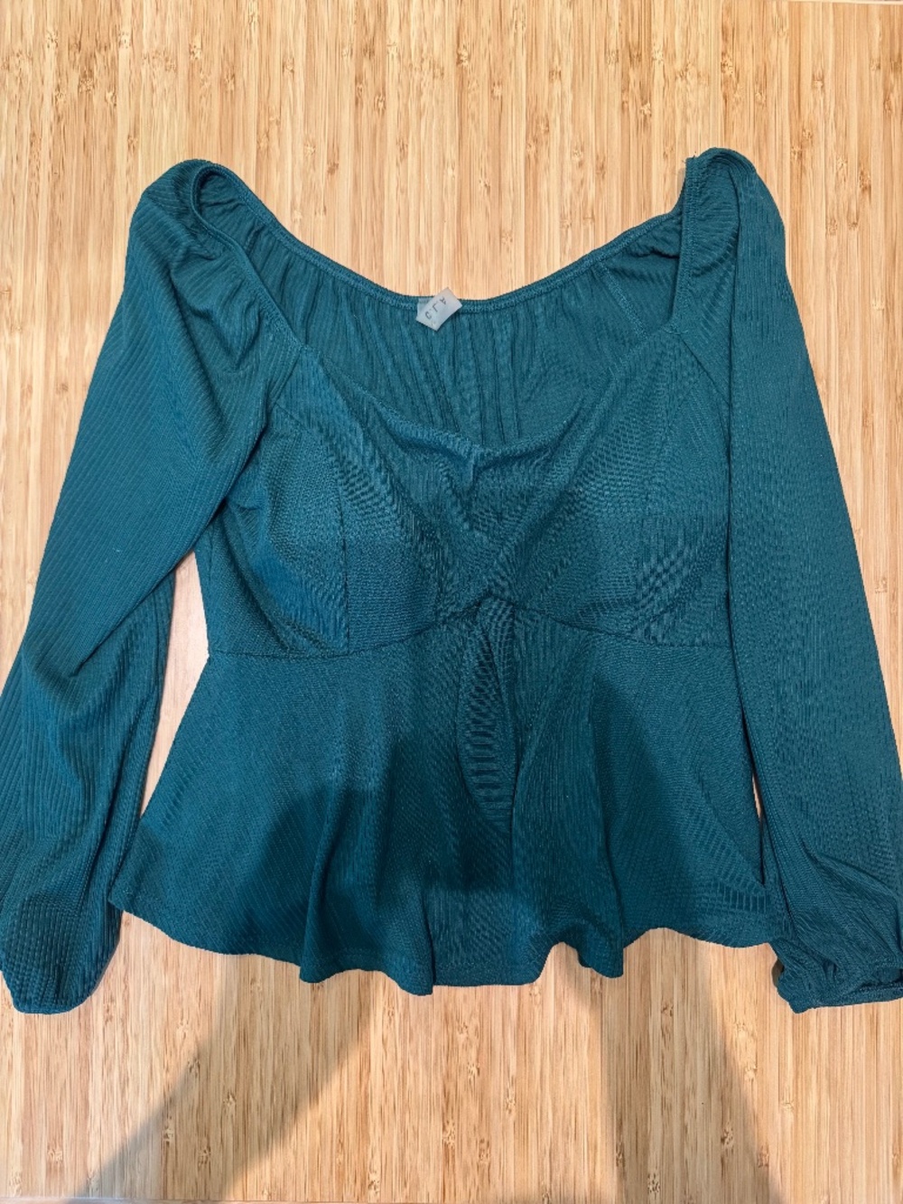 Green peplum top